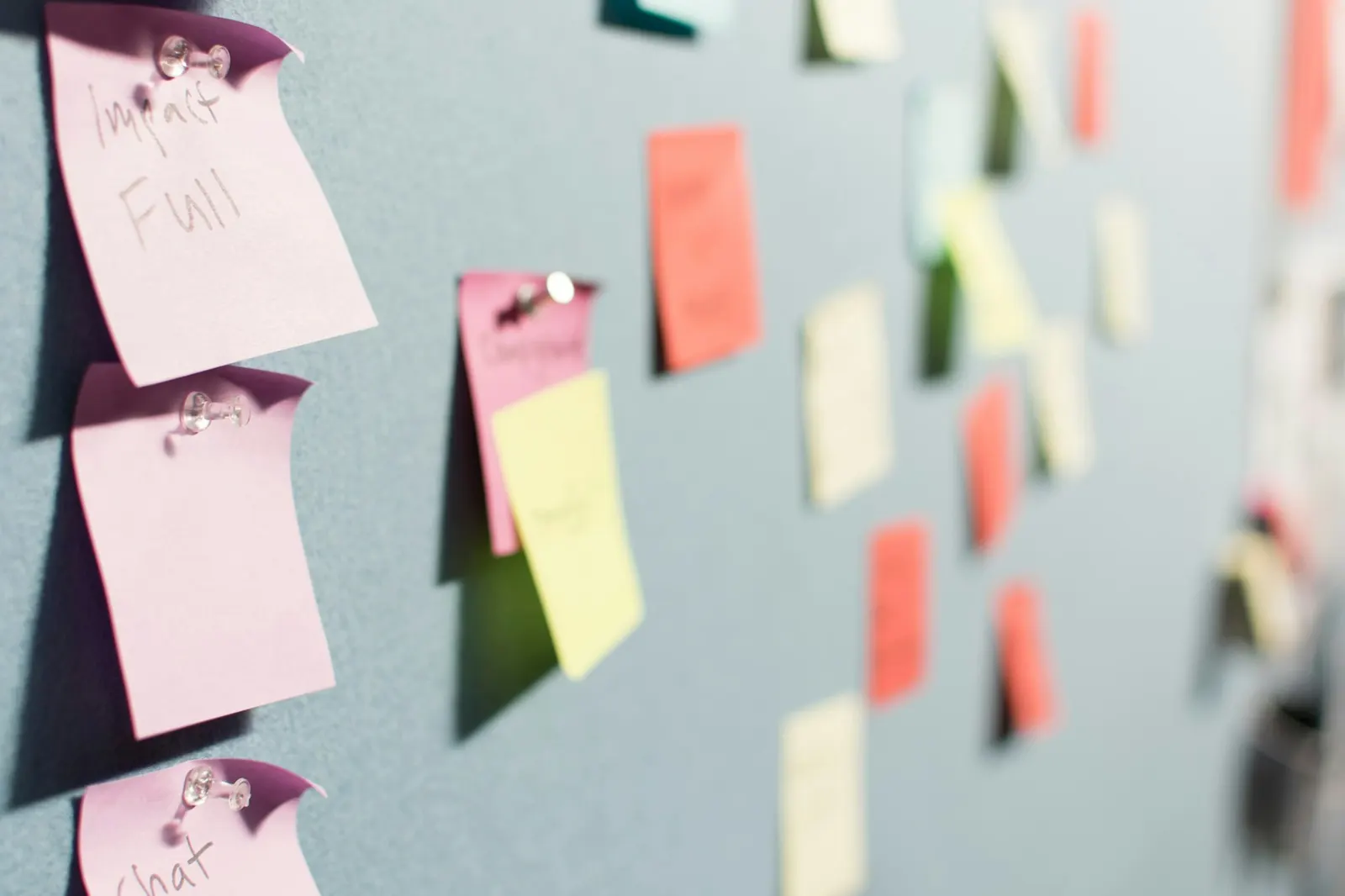 Colorful sticky notes pinned to a planning board, the kind of working plan a PR agency and client build together in the first month